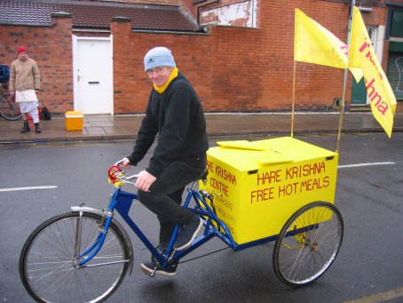 Bhakta Jimmy tries out the rickshaw